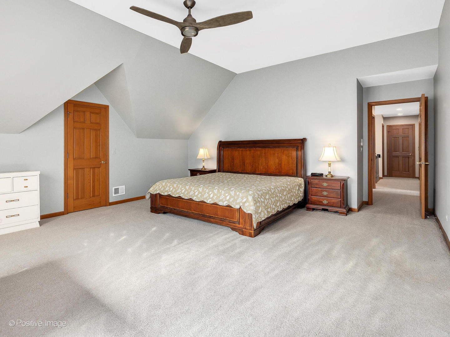 27W220 Jewell Road Winfield, IL 60190 - Photo 17 of 29 a bedroom with a bed and a cabinets