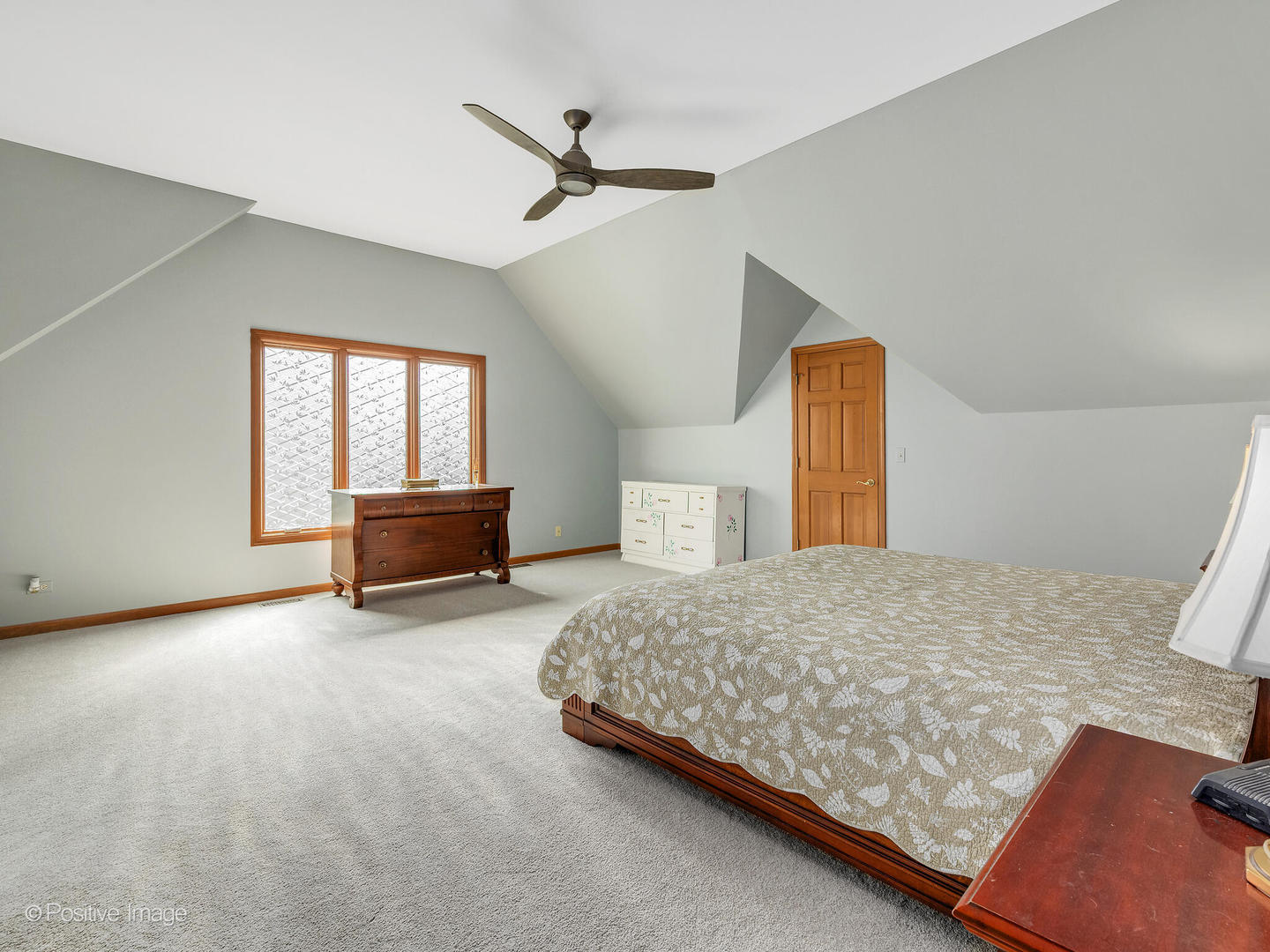 27W220 Jewell Road Winfield, IL 60190 - Photo 18 of 29 a bedroom with a bed and dresser
