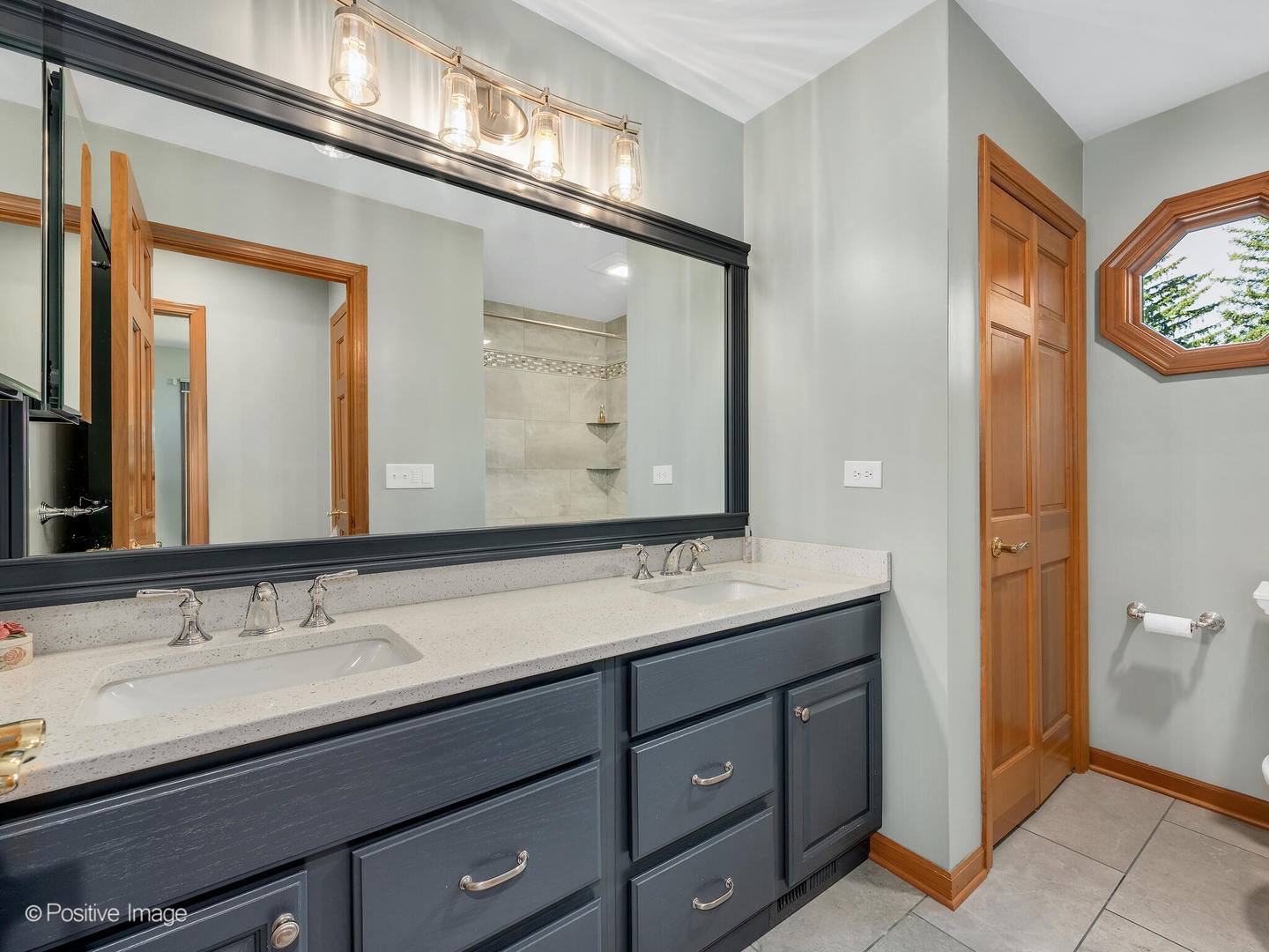 27W220 Jewell Road Winfield, IL 60190 - Photo 22 of 29 a bathroom with a granite countertop sink a large mirror and a toilet