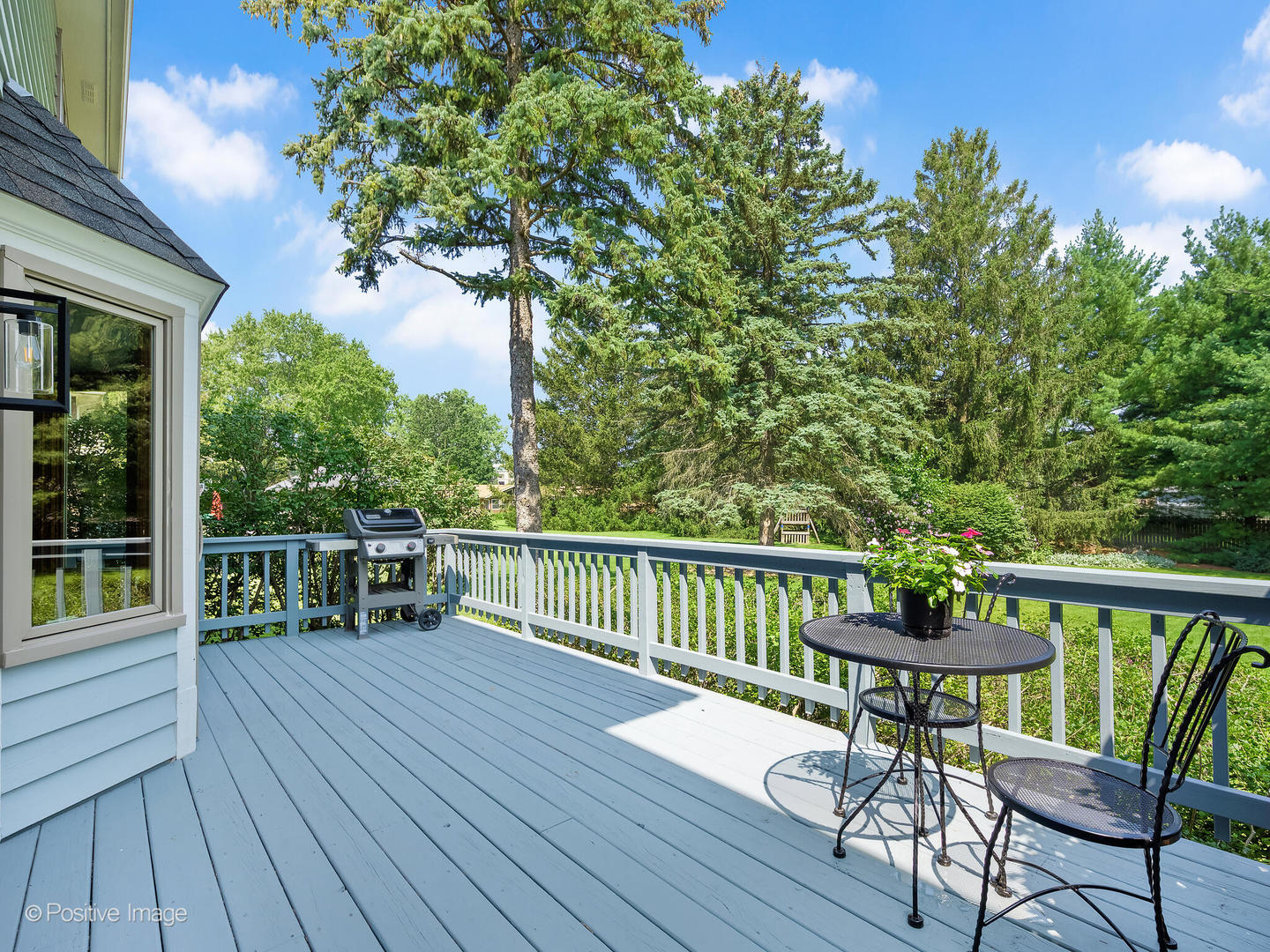 27W220 Jewell Road Winfield, IL 60190 - Photo 26 of 29 a view of a chairs and table on the wooden deck