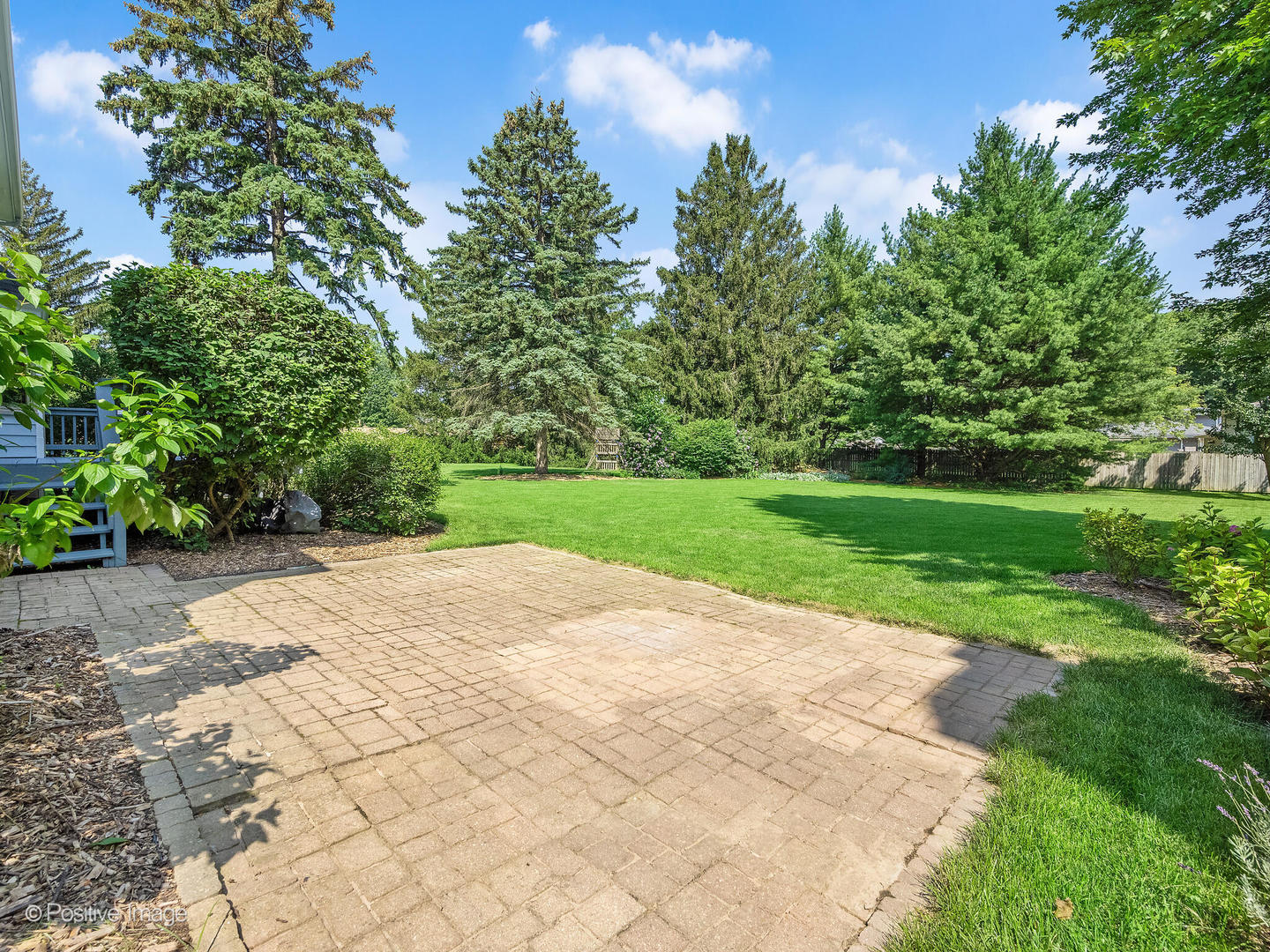 27W220 Jewell Road Winfield, IL 60190 - Photo 27 of 29 a view of a yard with plants and large trees