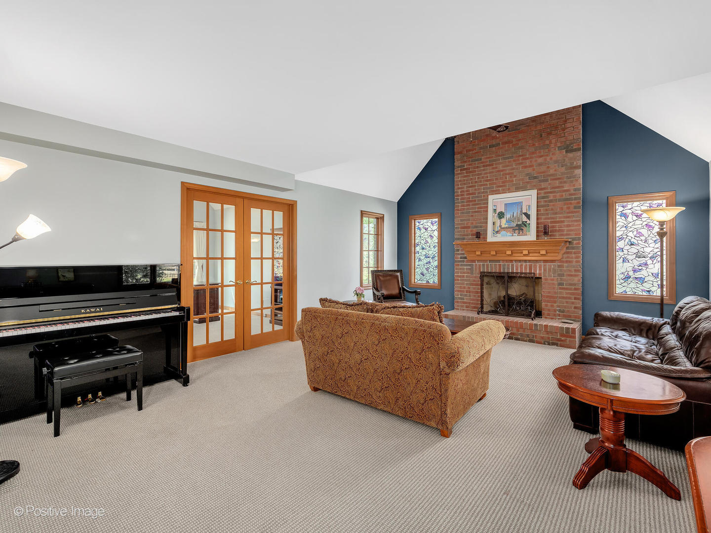 27W220 Jewell Road Winfield, IL 60190 - Photo 8 of 29 a living room with furniture a fireplace and a large window
