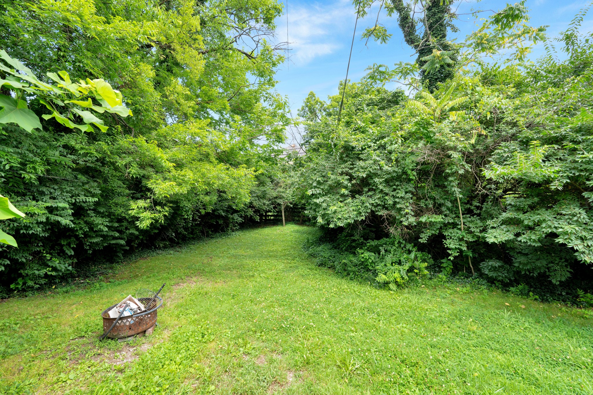 2220 Ashwood Avenue Nashville, TN 37212 - Photo 11 of 13 a backyard of a house with lots of green space