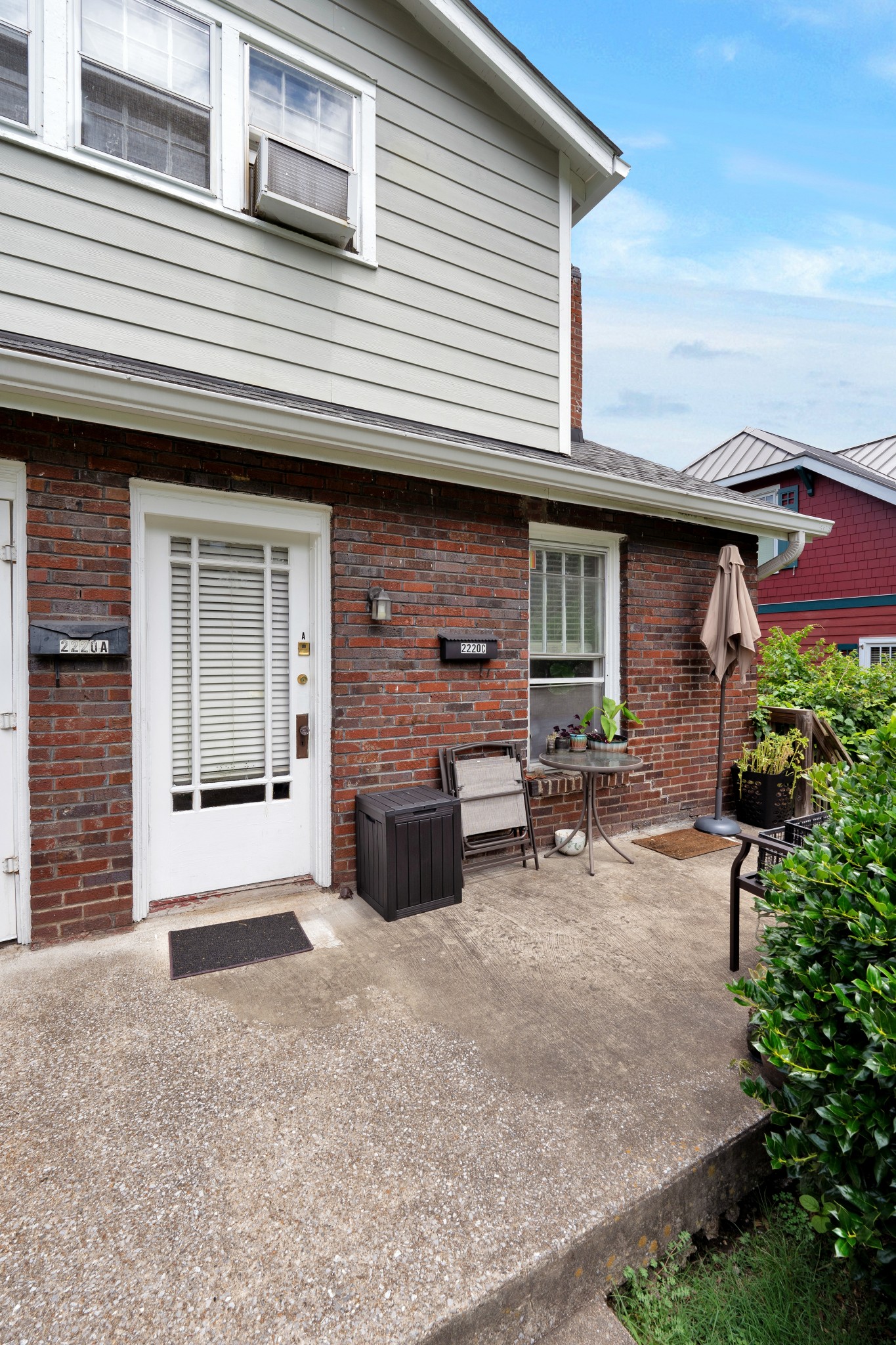 2220 Ashwood Avenue Nashville, TN 37212 - Photo 6 of 13 a view of an house with backyard and a garage