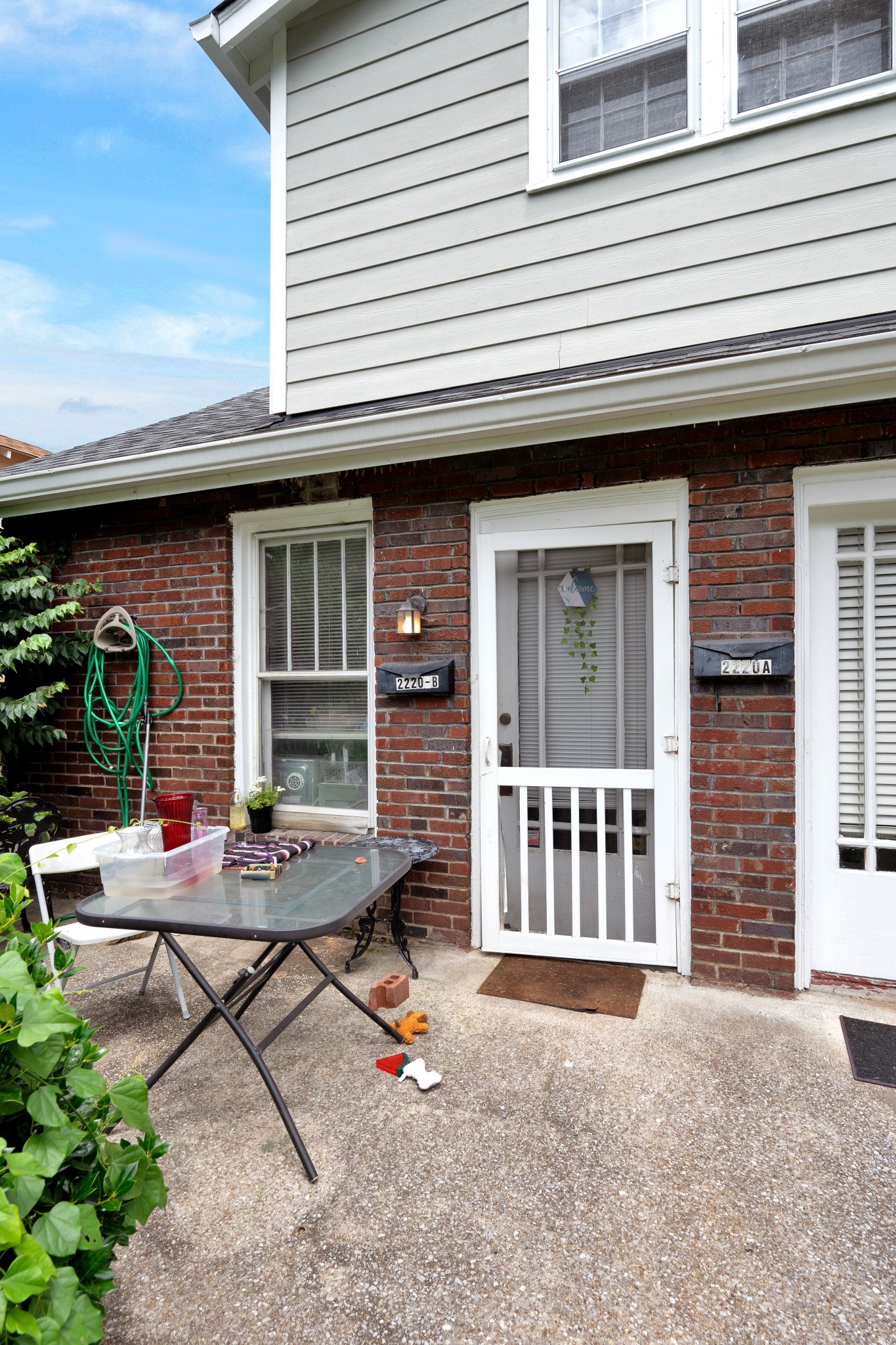 2220 Ashwood Avenue Nashville, TN 37212 - Photo 7 of 13 a backyard of a house with seating space and barbeque grill