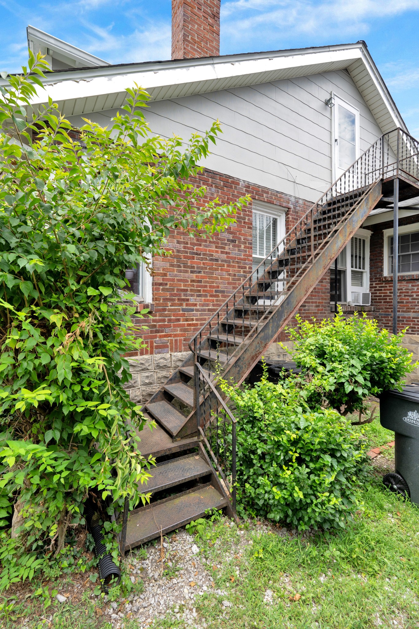 2220 Ashwood Avenue Nashville, TN 37212 - Photo 8 of 13 a front view of a house with a yard