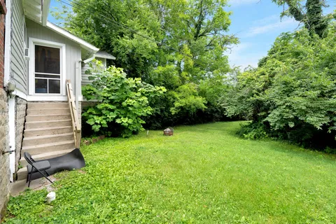 a view of a back yard of the house
