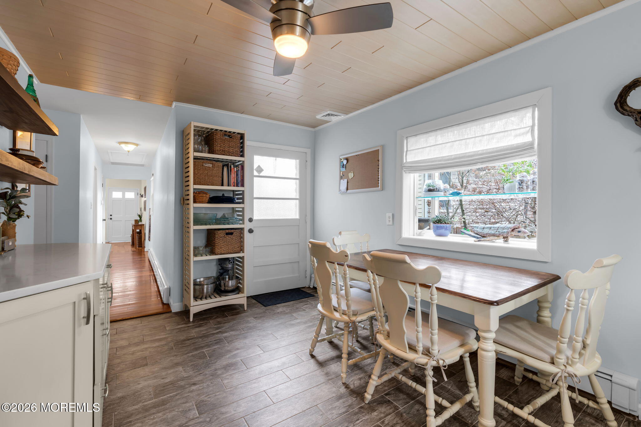 51 7th Street Belford, NJ 07718 - Photo 11 of 26 a view of a dining room with furniture and a window