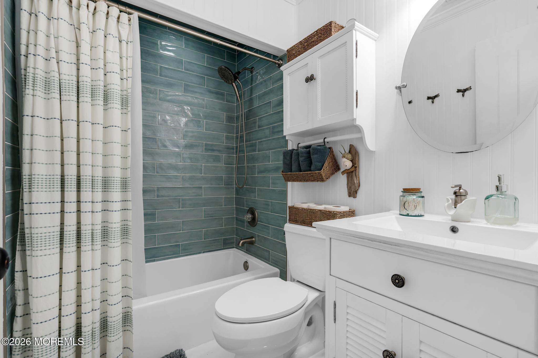 51 7th Street Belford, NJ 07718 - Photo 19 of 26 a bathroom with a sink a toilet and shower