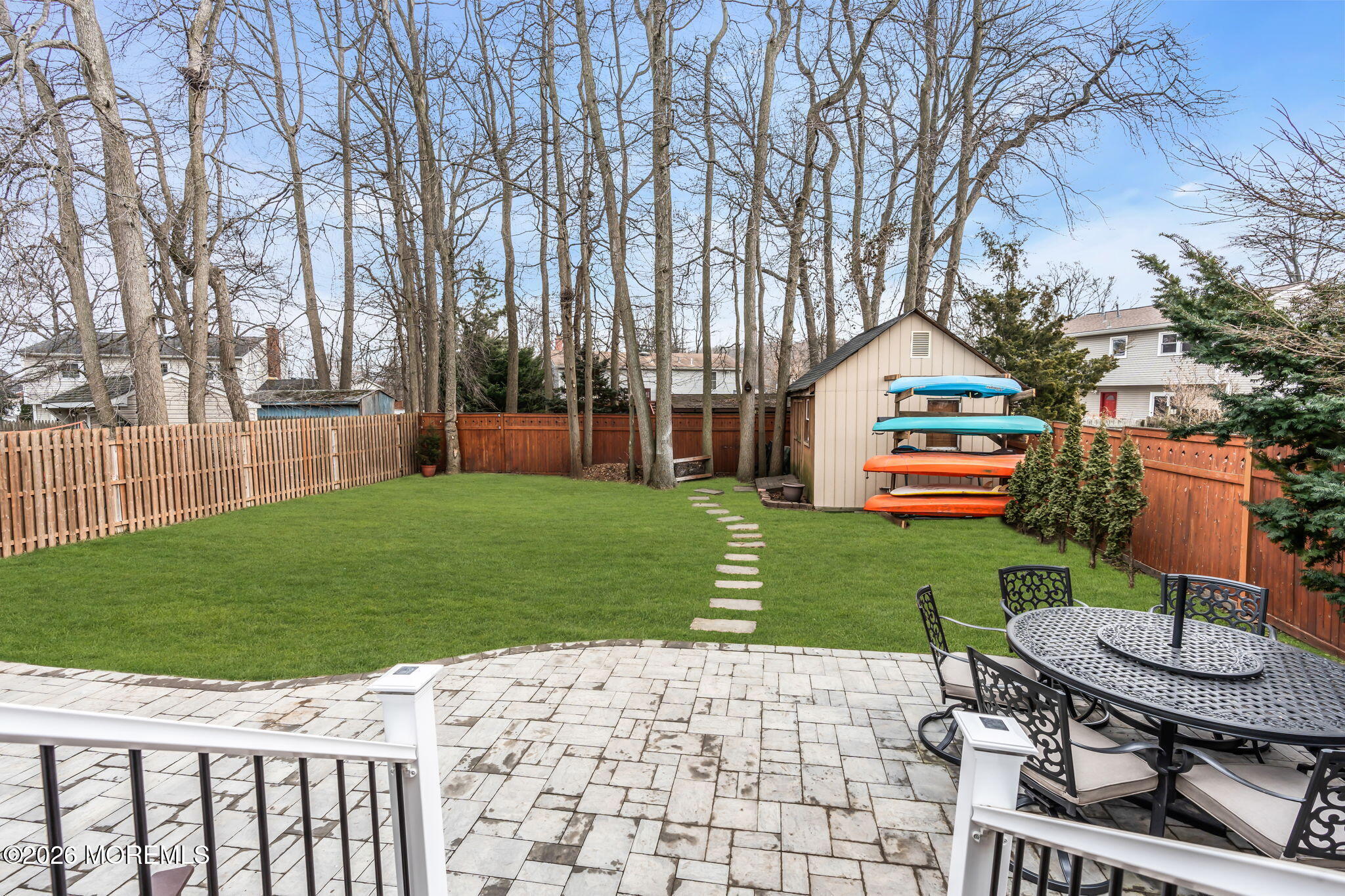 51 7th Street Belford, NJ 07718 - Photo 23 of 26 a front view of a house with garden