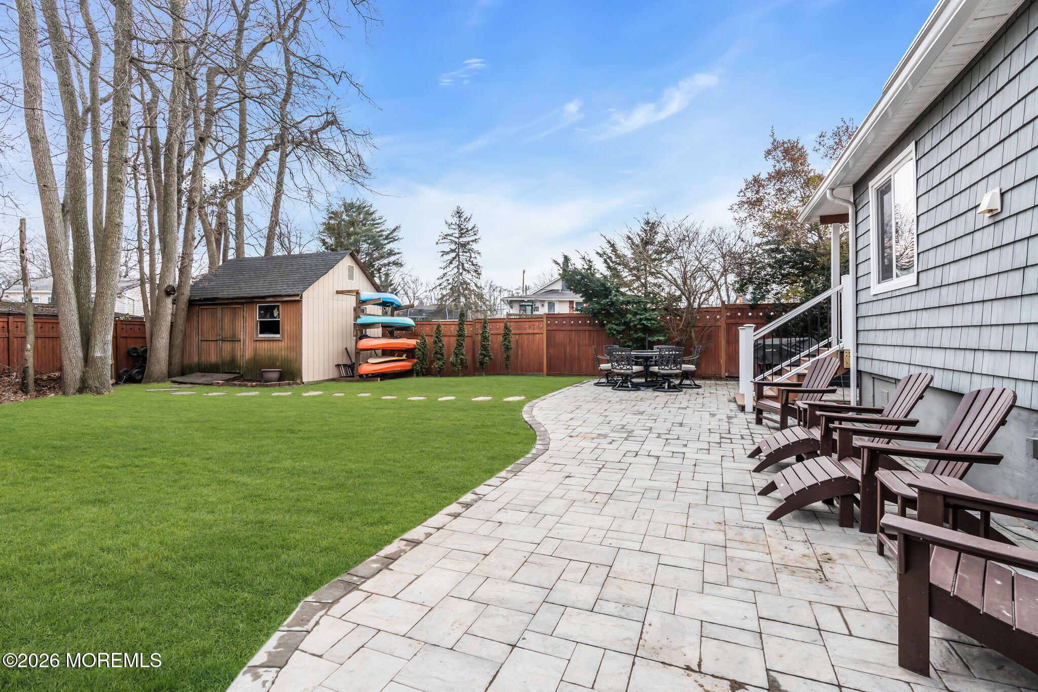 51 7th Street Belford, NJ 07718 - Photo 24 of 26 a front view of a house with garden
