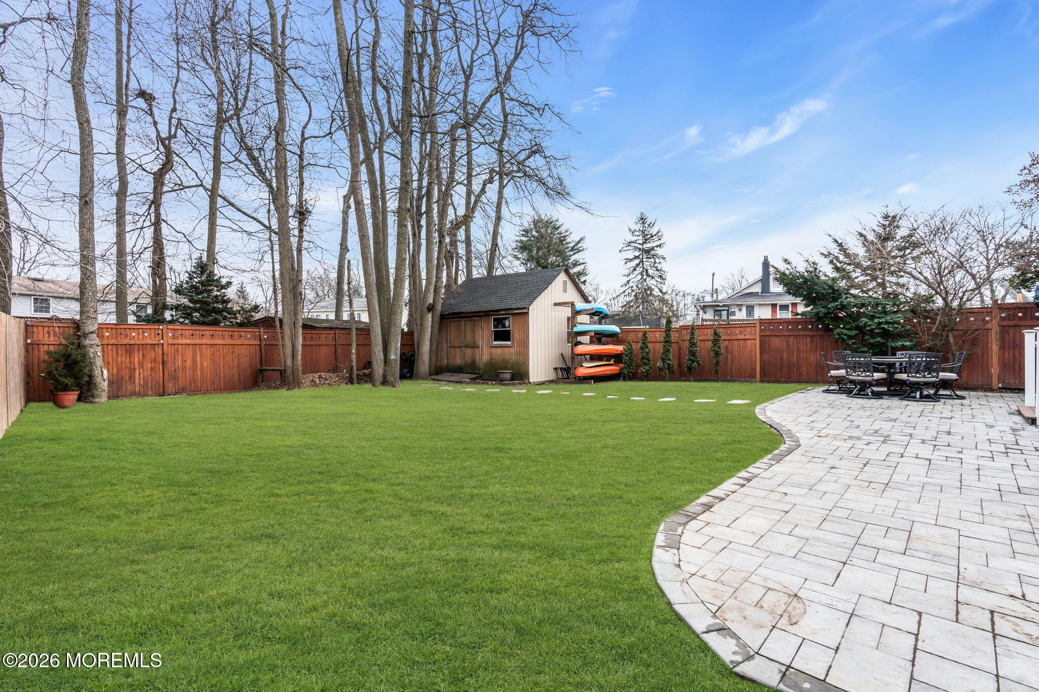 51 7th Street Belford, NJ 07718 - Photo 25 of 26 a view of a backyard with a garden