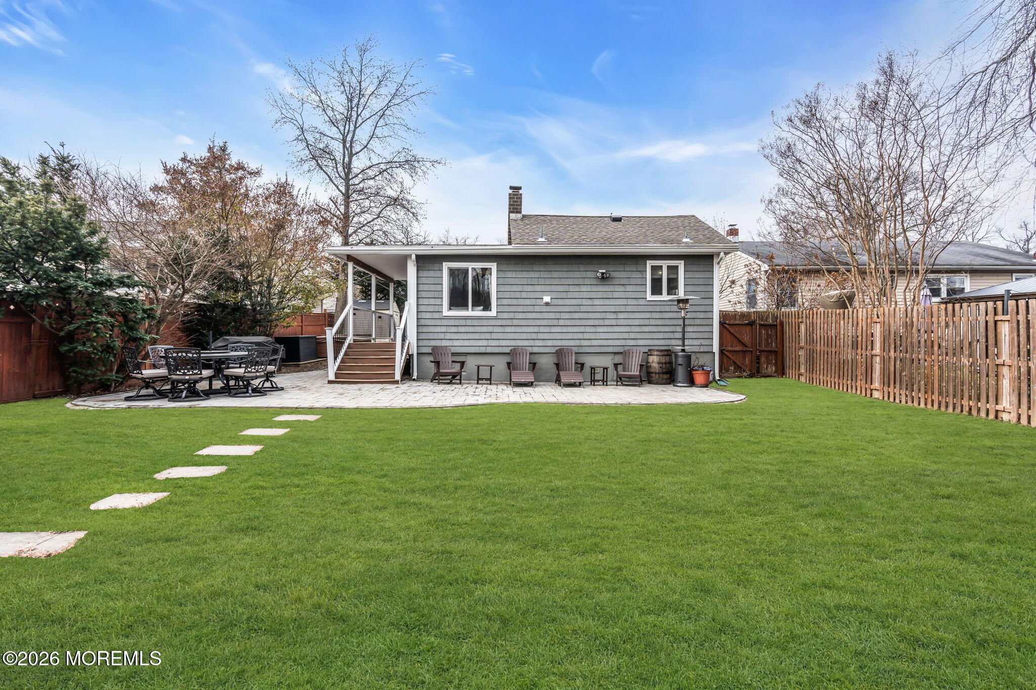 51 7th Street Belford, NJ 07718 - Photo 26 of 26 a view of a house with a yard porch and sitting area