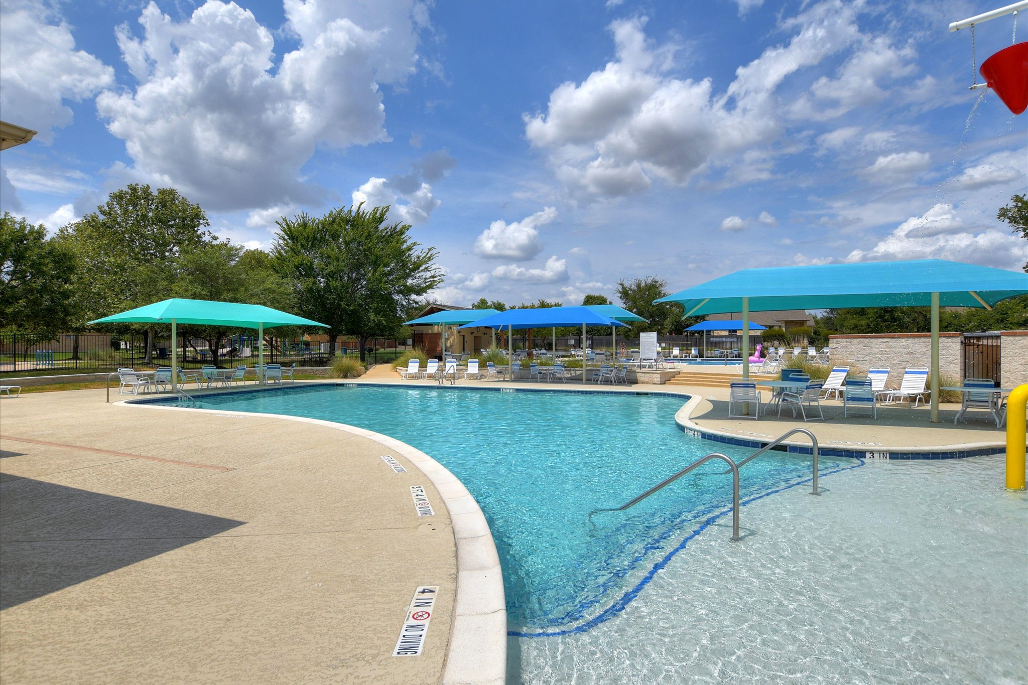 2864 Hearthsong Loop Round Rock, TX 78665 - Photo 23 of 29 Community pool featuring a patio