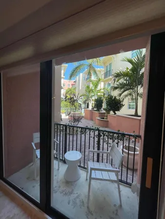 a view of a two chair in the balcony