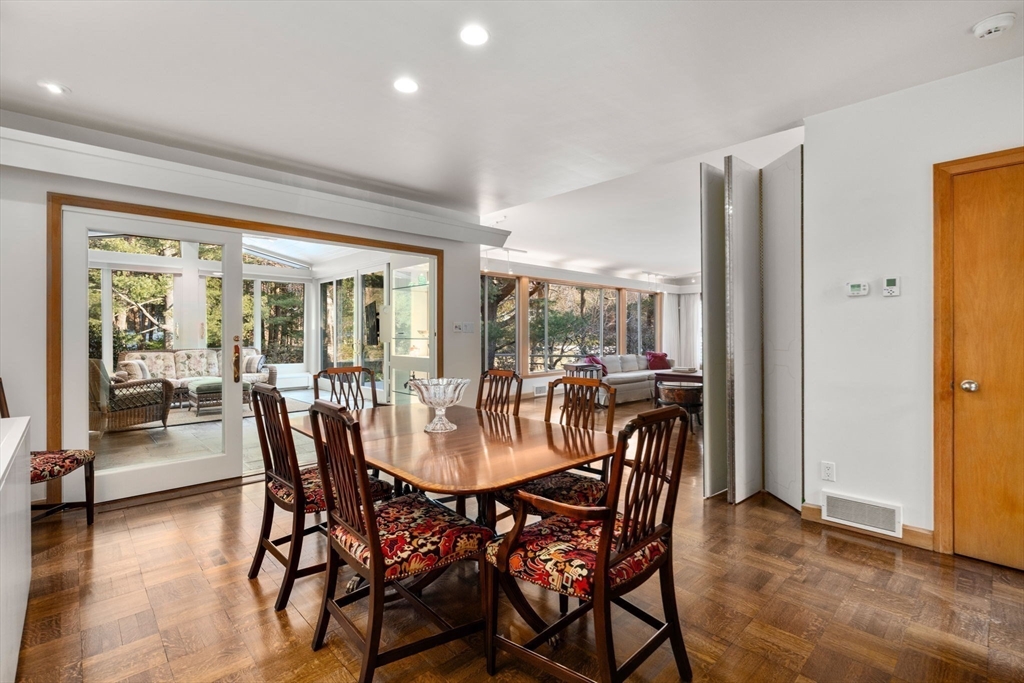 474 Salisbury Street Worcester, MA 01609 - Photo 13 of 40 a view of a dining room with furniture and wooden floor