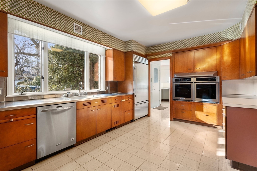474 Salisbury Street Worcester, MA 01609 - Photo 16 of 40 a large white kitchen with a large window