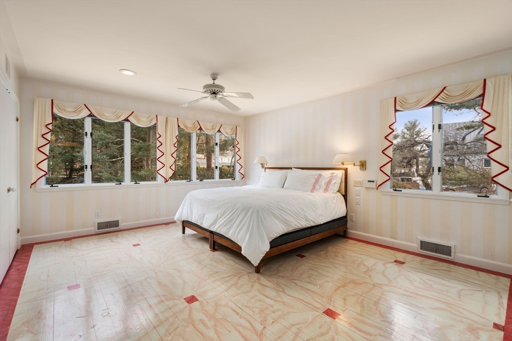 474 Salisbury Street Worcester, MA 01609 - Photo 23 of 40 a bed sitting in a room next to a window