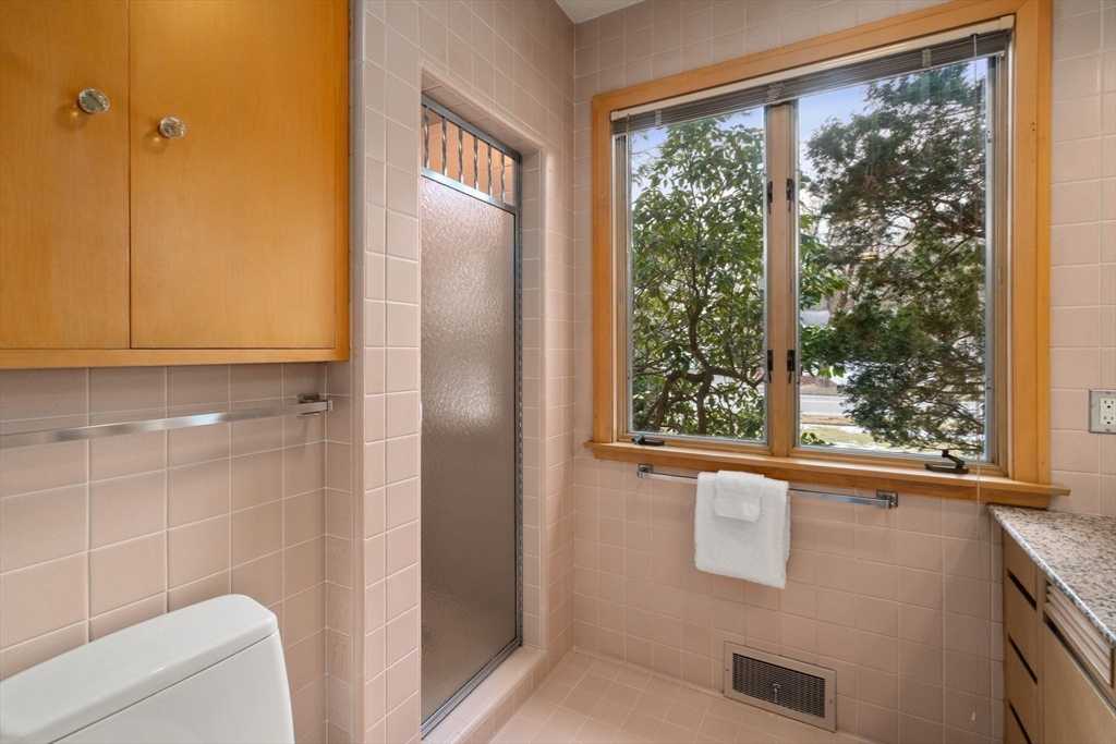 474 Salisbury Street Worcester, MA 01609 - Photo 27 of 40 a view of a bathroom with a large window