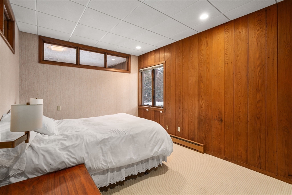 474 Salisbury Street Worcester, MA 01609 - Photo 34 of 40 a bedroom with a bed and a window