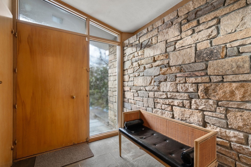 474 Salisbury Street Worcester, MA 01609 - Photo 4 of 40 a living room with a couch and a shower