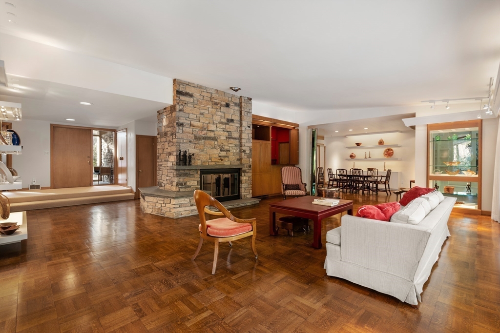 474 Salisbury Street Worcester, MA 01609 - Photo 6 of 40 a living room with fireplace furniture and a fireplace