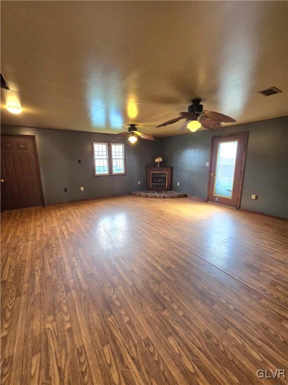 1015 Oak Street Coplay, PA 18037 - Photo 13 of 23 an empty room with wooden floor and a window