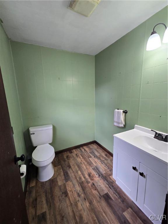 1015 Oak Street Coplay, PA 18037 - Photo 14 of 23 a bathroom with a toilet sink and a mirror