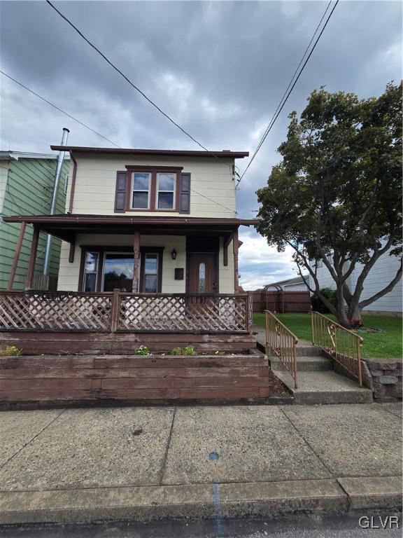 1015 Oak Street Coplay, PA 18037 - Photo 2 of 23 front view of a house with a yard