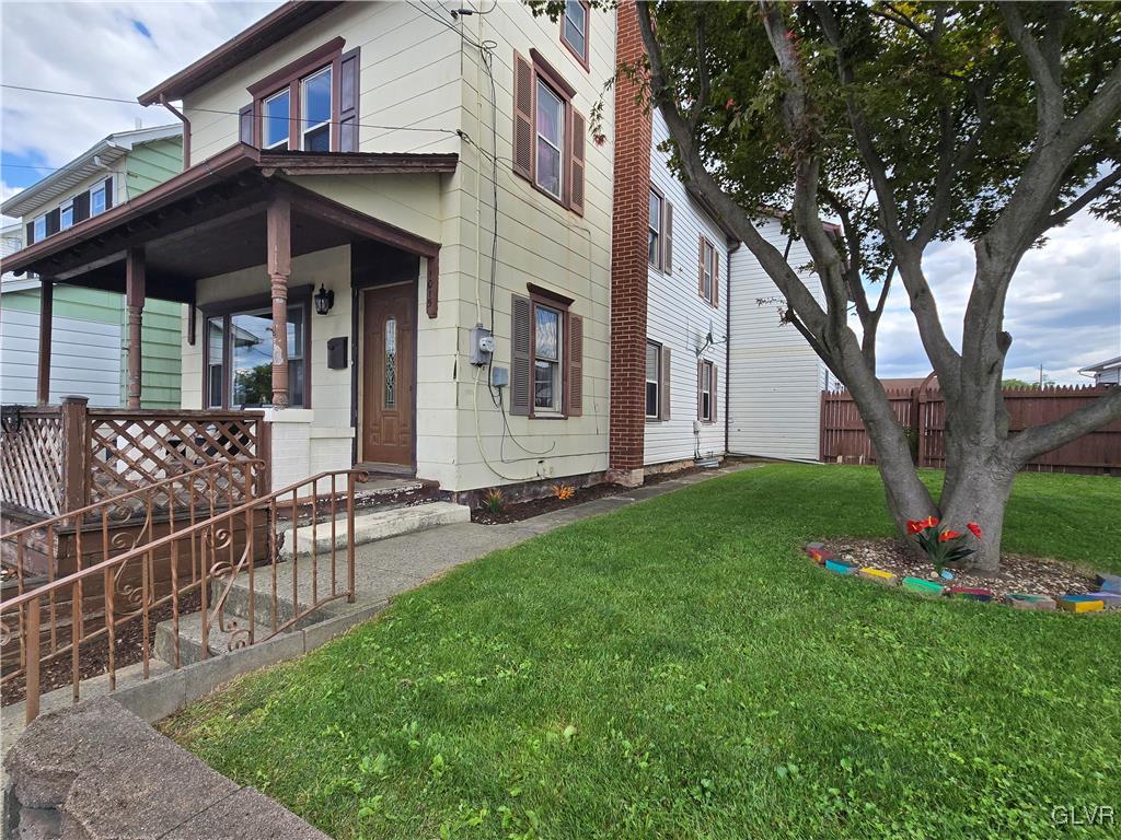 1015 Oak Street Coplay, PA 18037 - Photo 3 of 23 a view of a chair and table in backyard of house