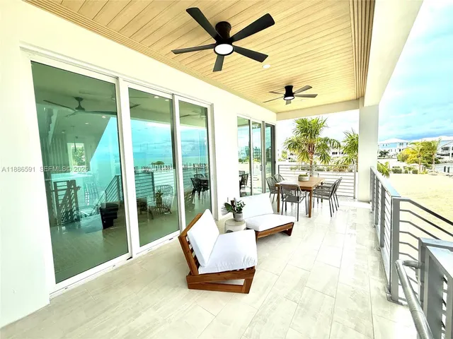 a dining room with a table and chairs and a table