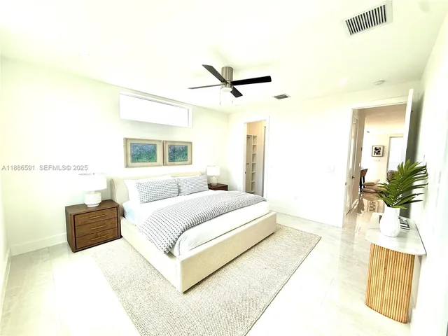 a view of a balcony with wooden floor