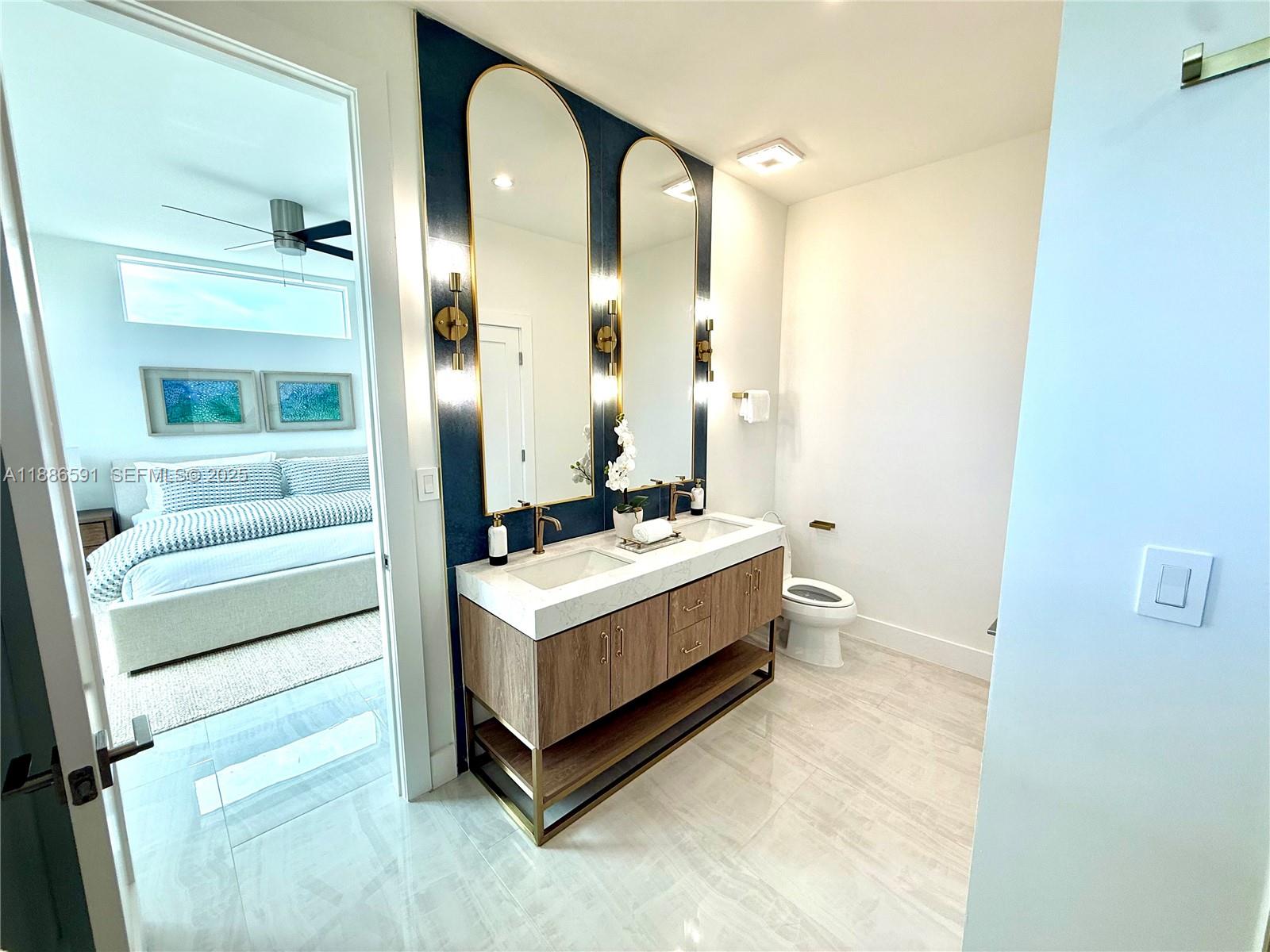 990 41st Gulf Street Marathon, FL 33050 - Photo 21 of 51 a bathroom with a sink and a mirror