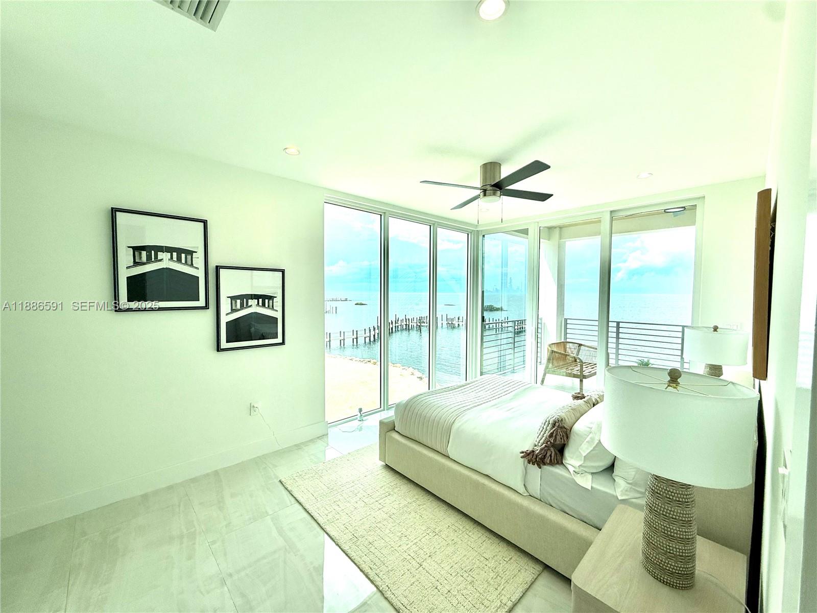 990 41st Gulf Street Marathon, FL 33050 - Photo 33 of 51 a bedroom with a bed and a large window