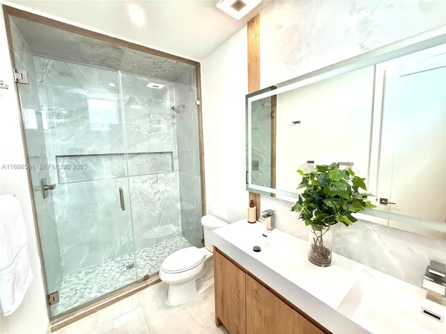 a balcony with furniture and city view