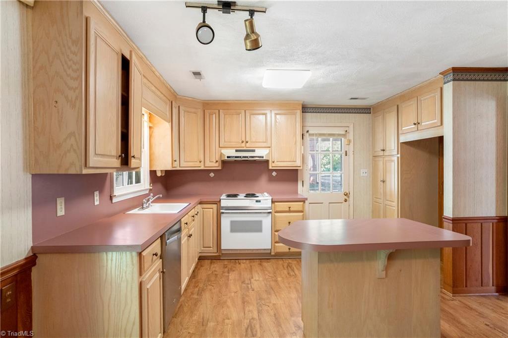 310 Doub Road Lewisville, NC 27023 - Photo 18 of 31 Kitchen with entrance from the screened in porch