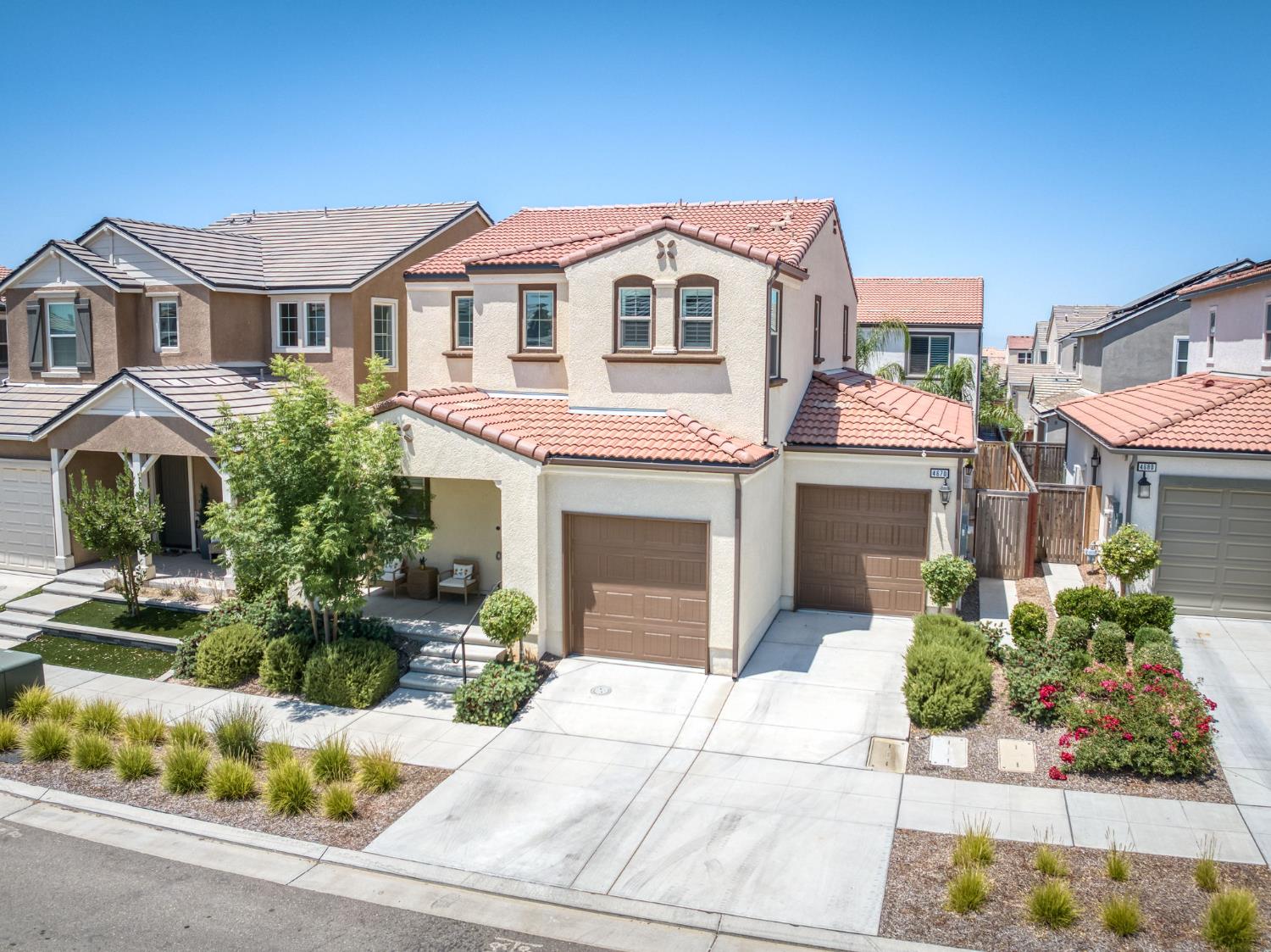4670 Terrace Road Madera, CA 93636 - Photo 41 of 53 a front view of a house with a garden