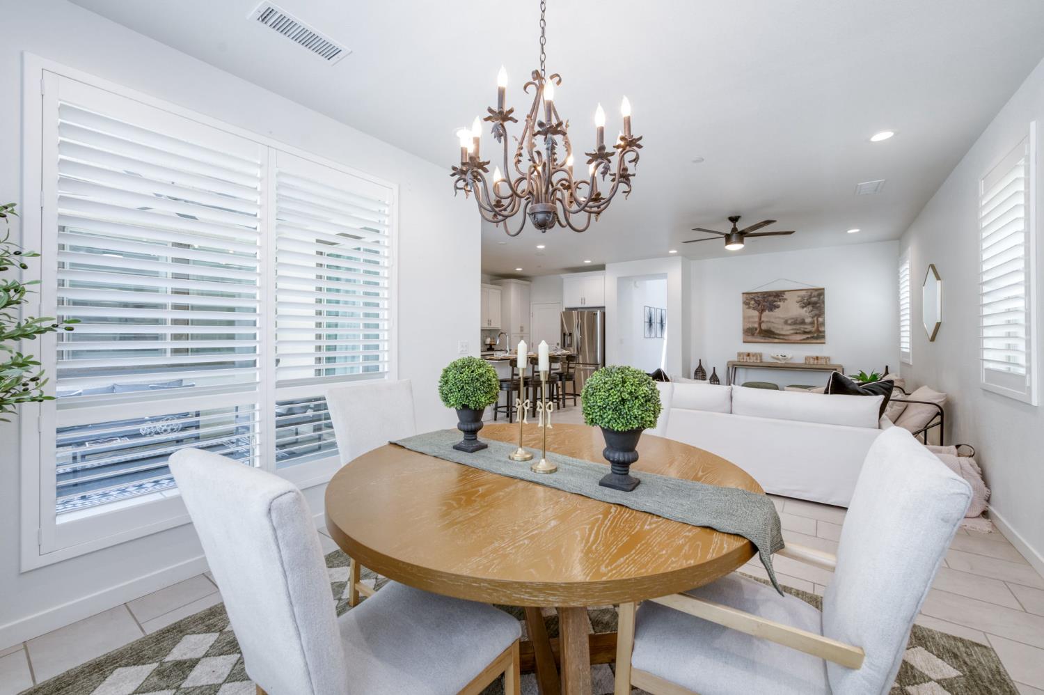 4670 Terrace Road Madera, CA 93636 - Photo 10 of 53 a view of a dining room with furniture and window