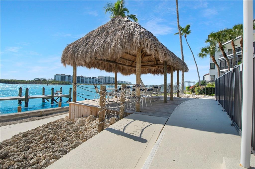 60 West Pelican Street, Unit 505 Naples, FL 34113 - Photo 25 of 41 a view of a swimming pool with a patio