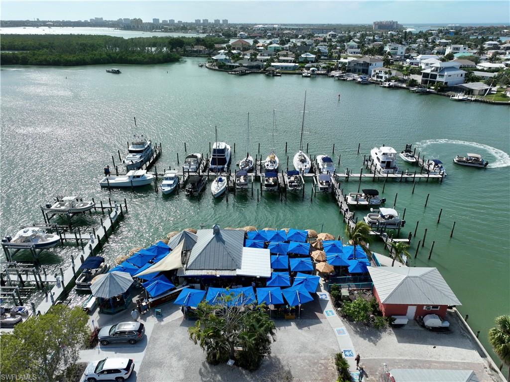 60 West Pelican Street, Unit 505 Naples, FL 34113 - Photo 39 of 41 an aerial view of a lake view