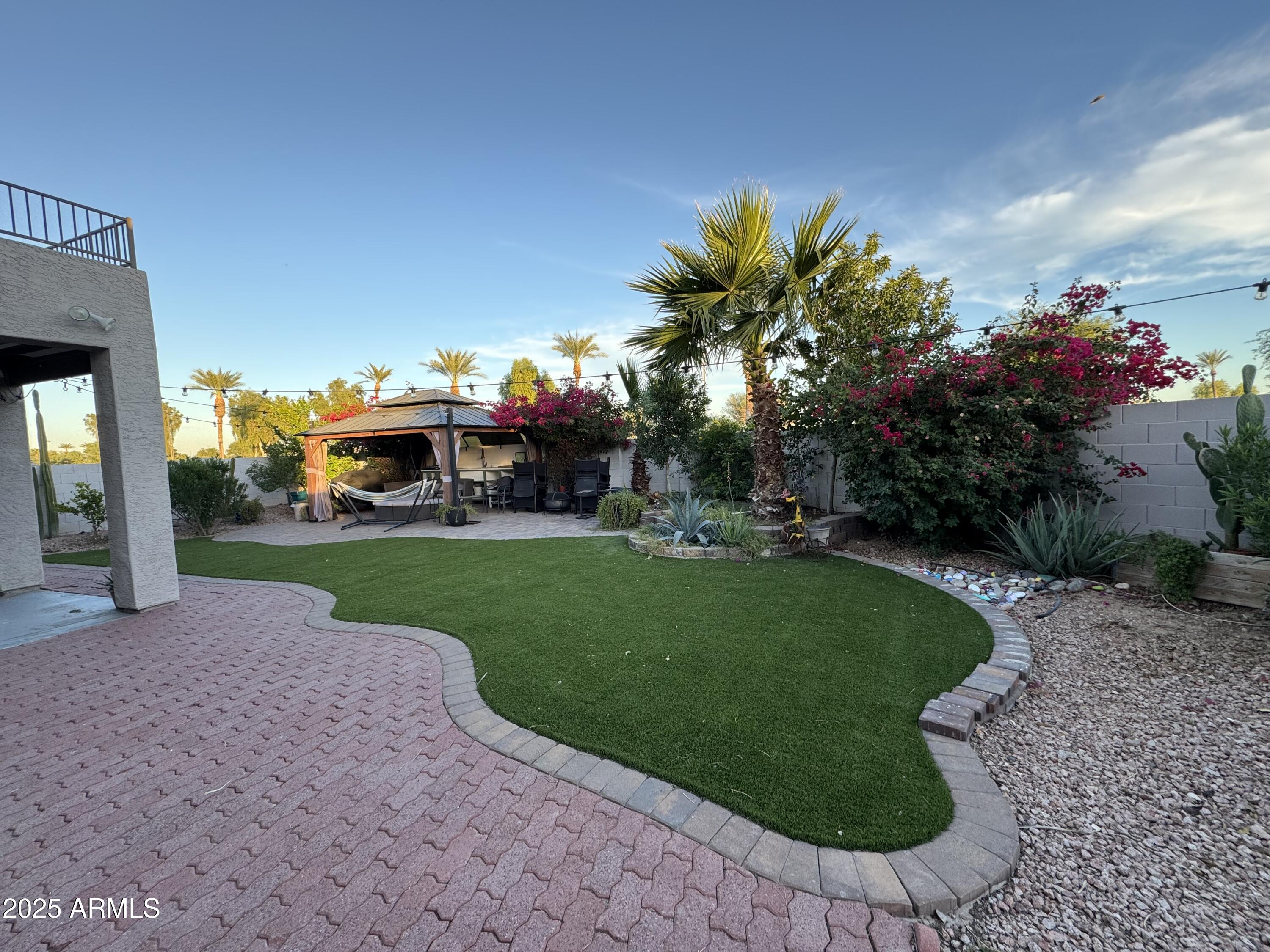 13781 West Vernon Avenue Goodyear, AZ 85395 - Photo 25 of 25 a view of a house with a back yard