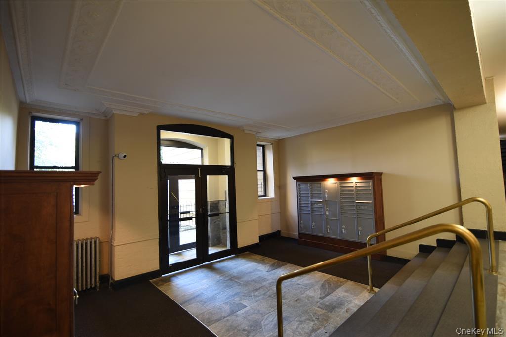 83-52 Talbot Street, Unit 5C Queens, NY 11415 - Photo 4 of 22 a living room with furniture