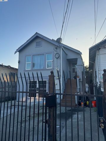 a view of a house with wooden deck