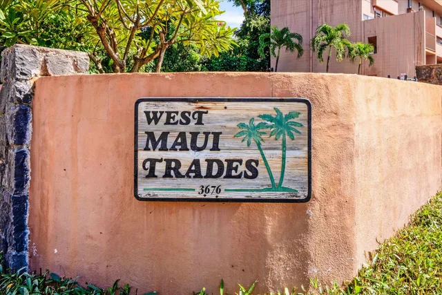 a street sign on a wooden wall
