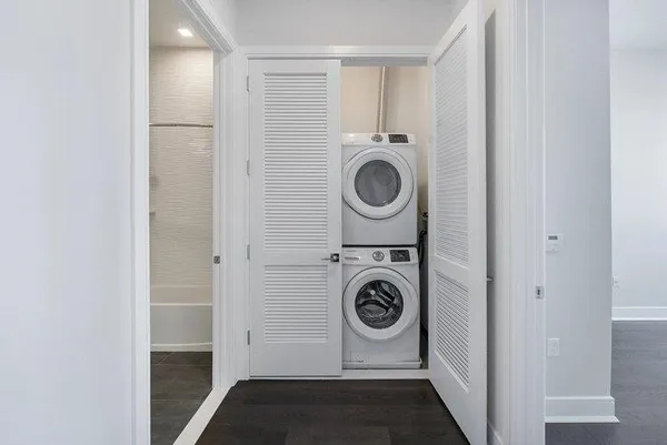 a utility room with dryer and washer