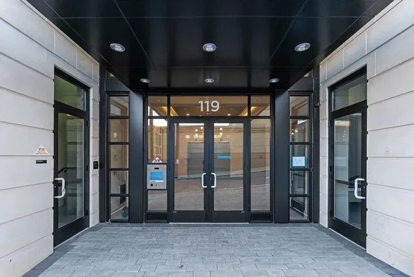 a view of a building with glass door