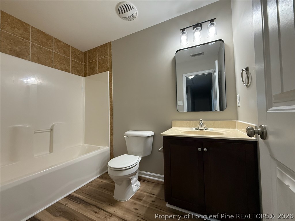 Undisclosed Address Spring Lake, NC 28390 - Photo 34 of 50 a bathroom with a sink and a mirror