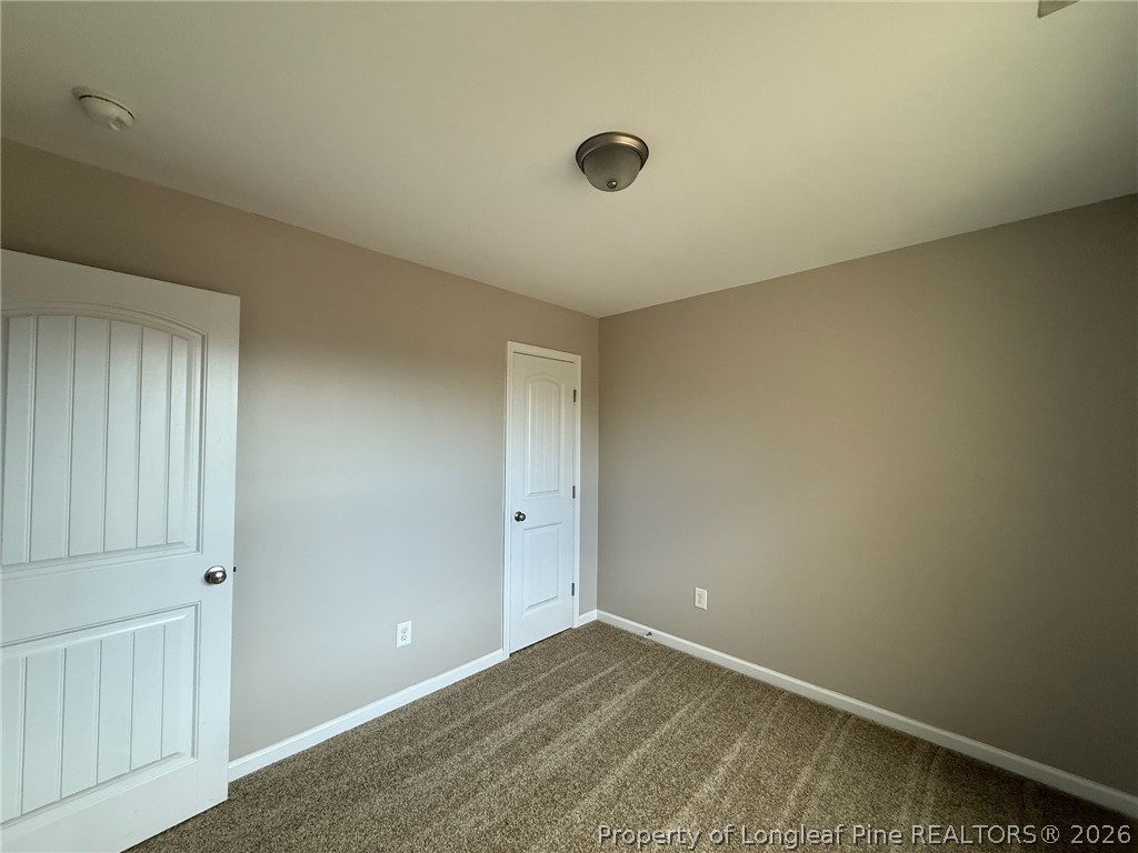 Undisclosed Address Spring Lake, NC 28390 - Photo 41 of 50 a view of an empty room