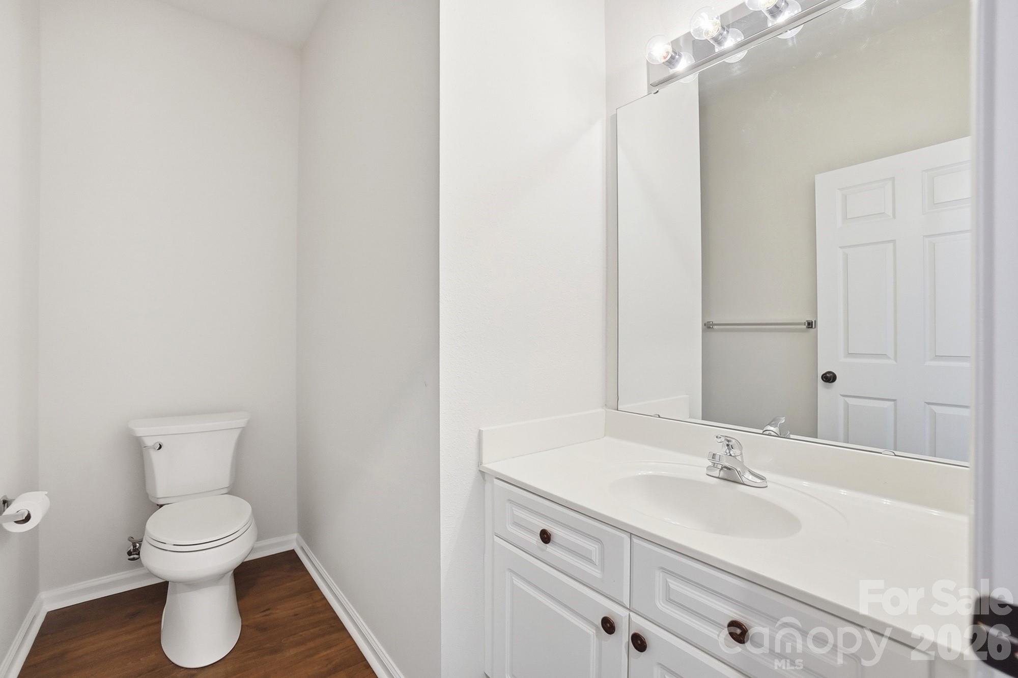 711 Stone Village Drive Fort Mill, SC 29708 - Photo 23 of 46 a bathroom with a sink toilet and a mirror