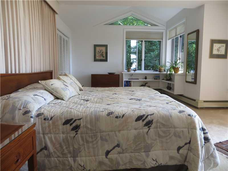 69 Lincoln Point Road Wayne, ME 04284 - Photo 14 of 35 Master Bedroom. The bed faces the...